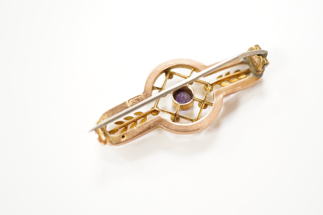 A Victorian 15ct and diamond set navette shaped Etruscan style brooch (lacking pin), 46mm, gross weight 3.5 grams, a 9ct, amethyst and seed pearl set bar brooch and a 9ct, garnet and split pearl set wreath brooch, gross
